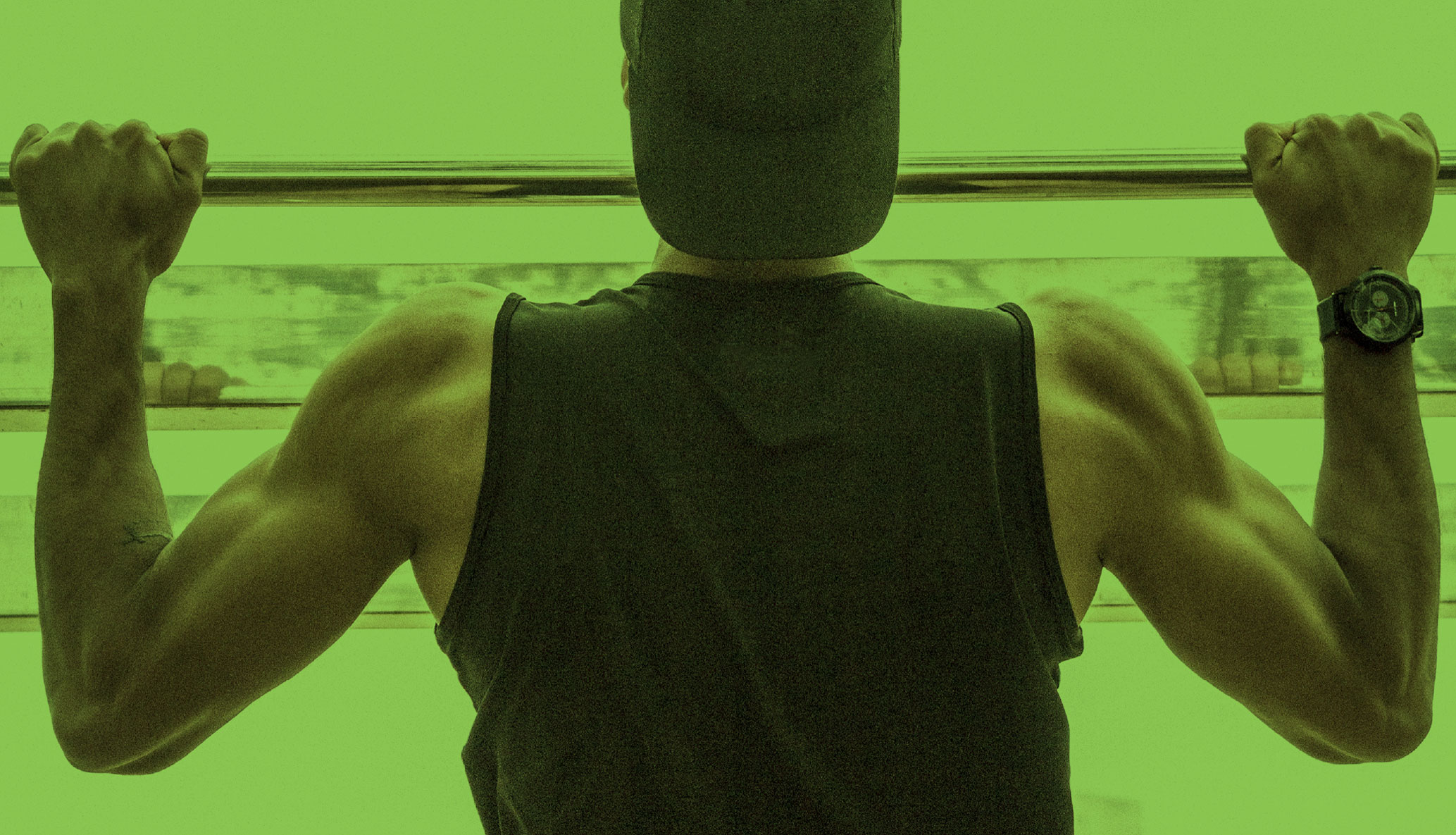 Image of a man doing a pull up